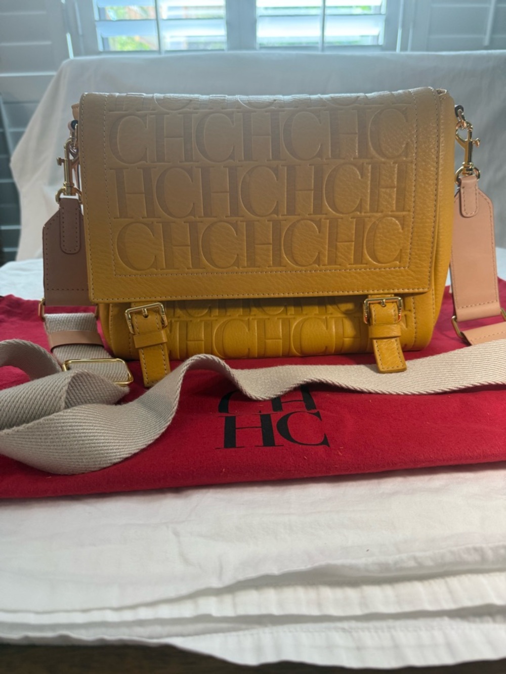 Carolina Herrera Embossed Logo Crossbody Bag in Mimosa